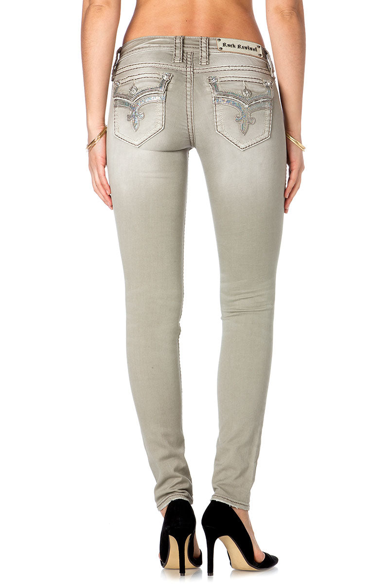 Graue Skinny-Jeans mit heller Waschung und dekorativen Taschenstichen, figurbetont geschnitten.