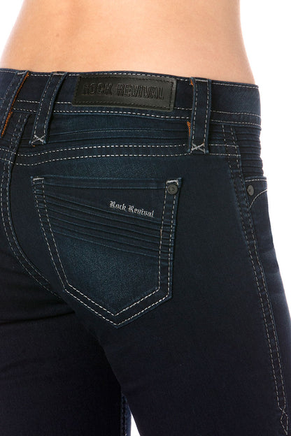 Dunkelblaue Skinny-Jeans für Damen mit markantem Rückenlabel und kontrastierenden Nähten.