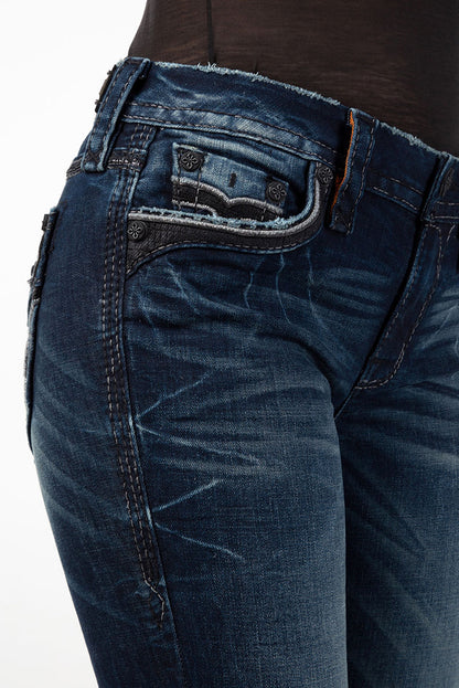 Dunkelblaue Bootcut-Jeans mit heller Naht und leichter Used-Waschung am Oberschenkel.